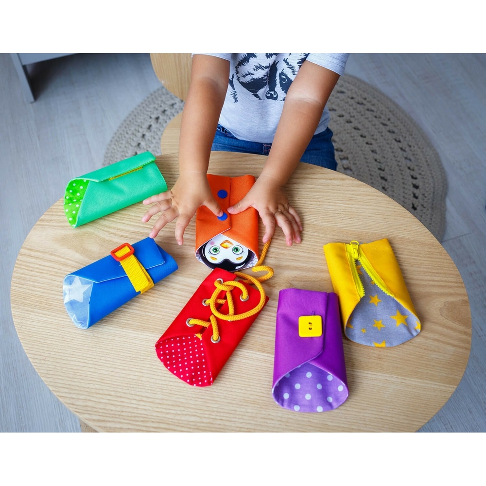 Фото, Видеообзоры бізіборд із застібками "курточки" roter kafer rz3001-01