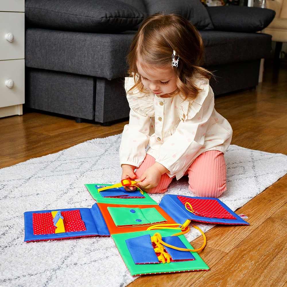 Фото, Видеообзоры бізіборд із застібками "хрестик" roter kafer rz2001-01